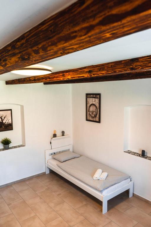 Postel nebo postele na pokoji v ubytování Apartmány Pulgary