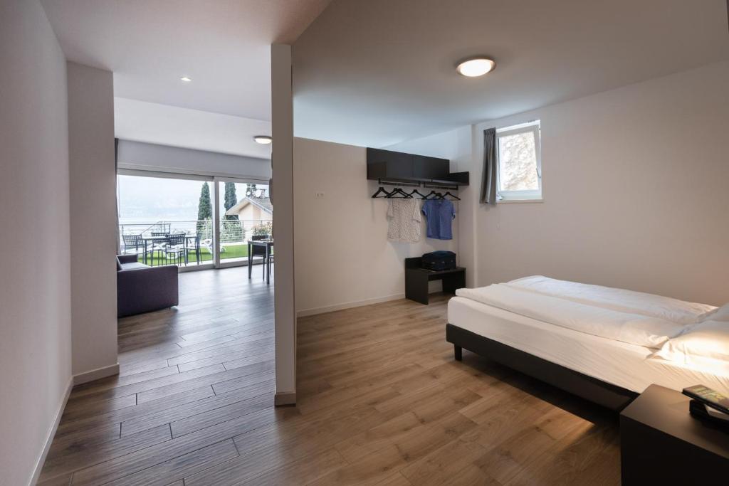 Posteľ alebo postele v izbe v ubytovaní Residence Solei Classic & Plus