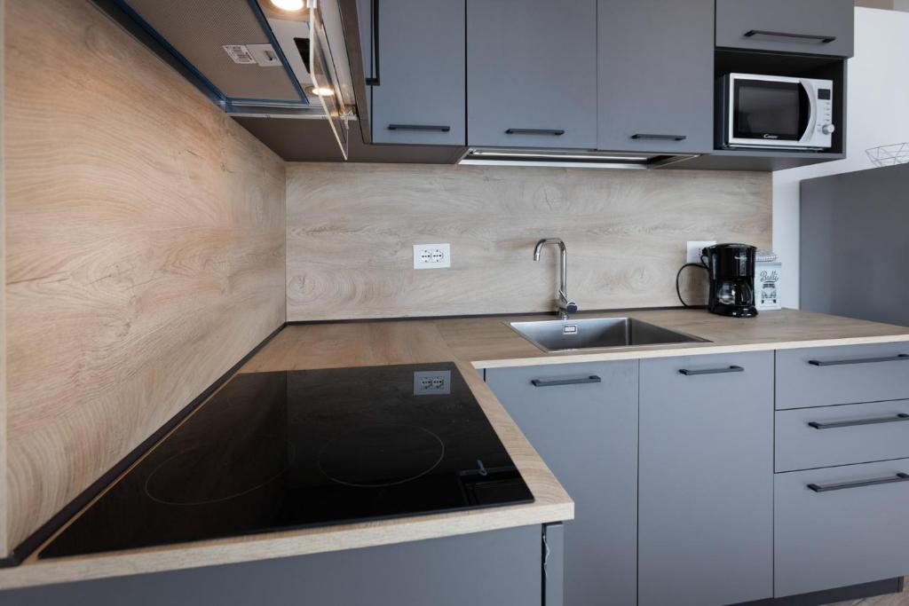 Kuchyňa alebo kuchynka v ubytovaní Residence Solei Classic & Plus