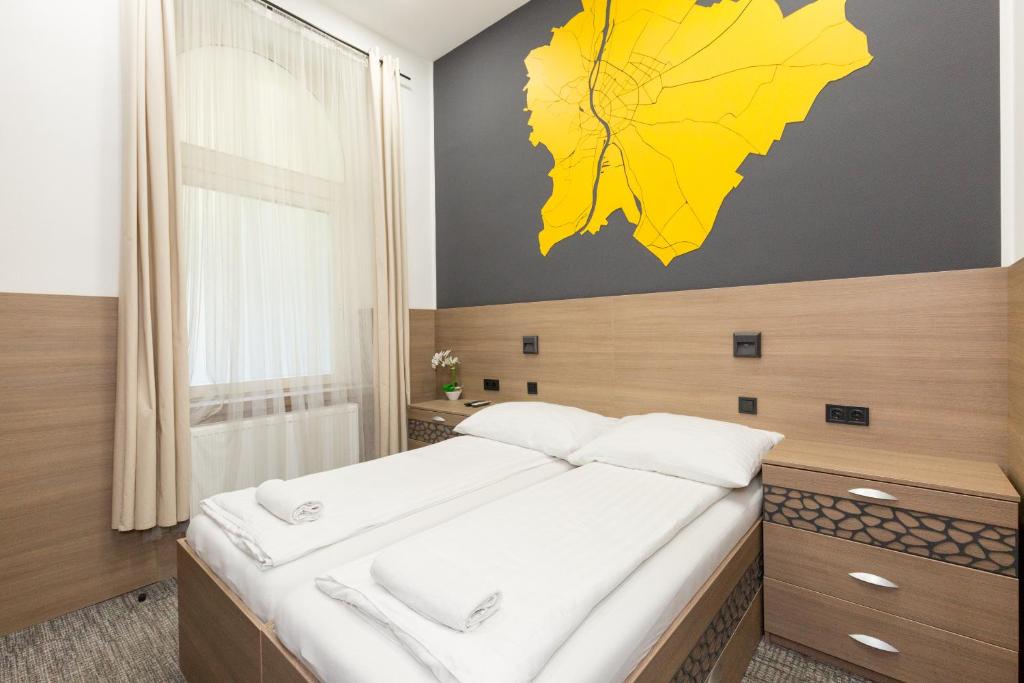 Posteľ alebo postele v izbe v ubytovaní E14 Design Hostel