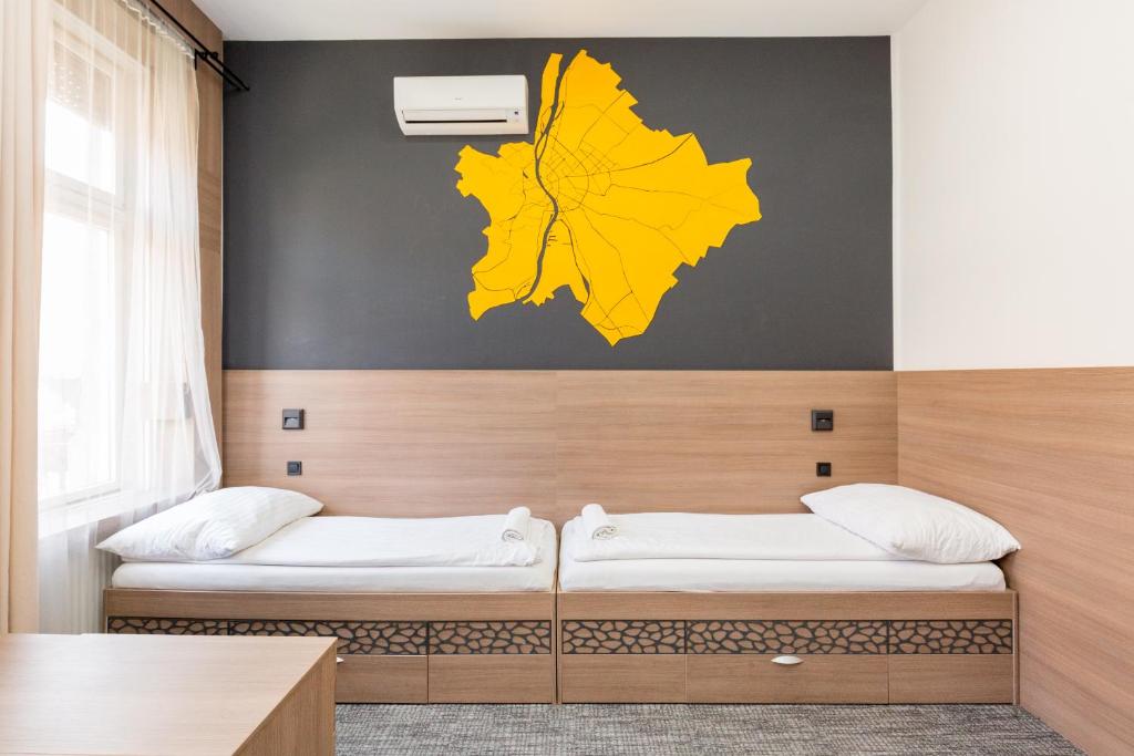Posteľ alebo postele v izbe v ubytovaní E14 Design Hostel