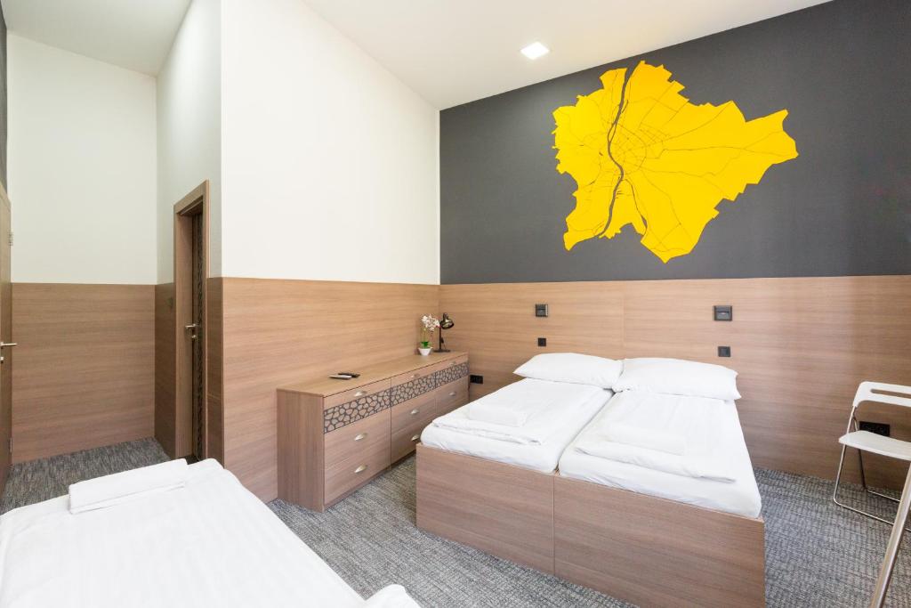 Posteľ alebo postele v izbe v ubytovaní E14 Design Hostel