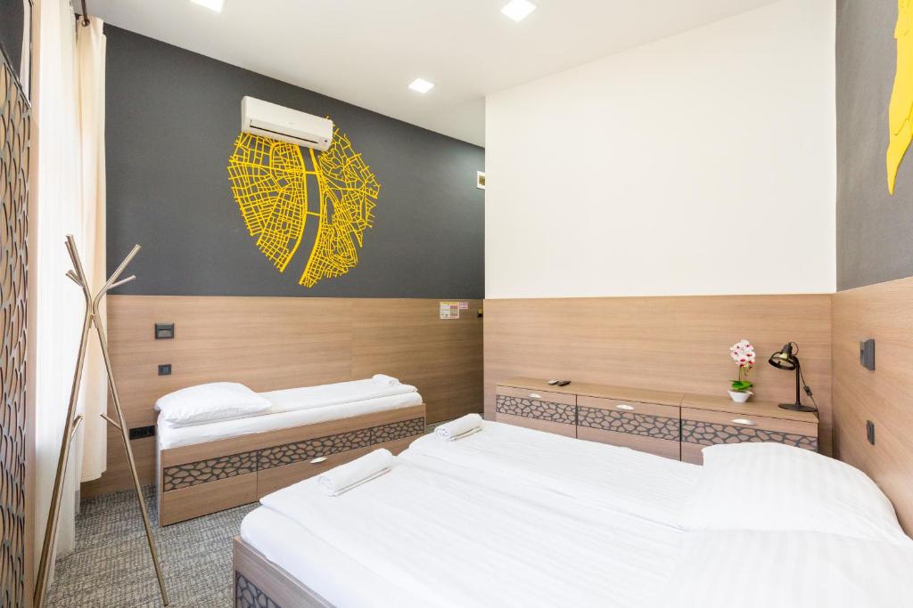Posteľ alebo postele v izbe v ubytovaní E14 Design Hostel