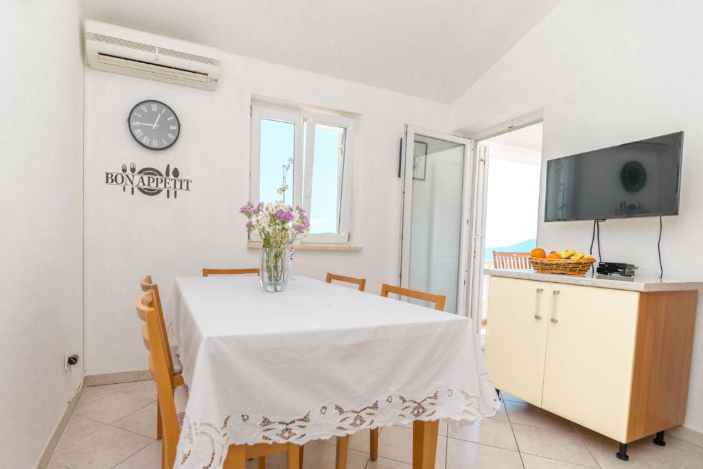 TV a/nebo společenská místnost v ubytování Apartmani Noris (app2)