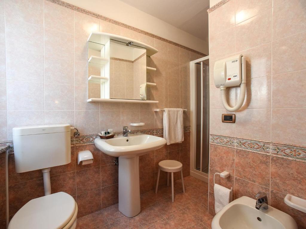 Koupelna v ubytování Hotel Adriana