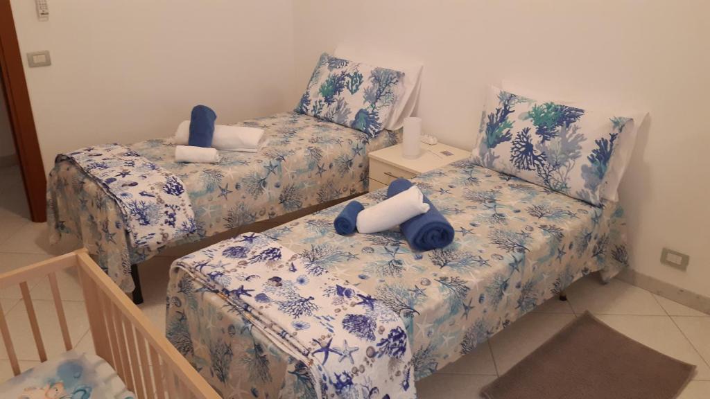 Postel nebo postele na pokoji v ubytování Le case di Sara n.7