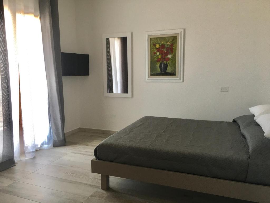 Łóżko lub łóżka w pokoju w obiekcie Villa INN