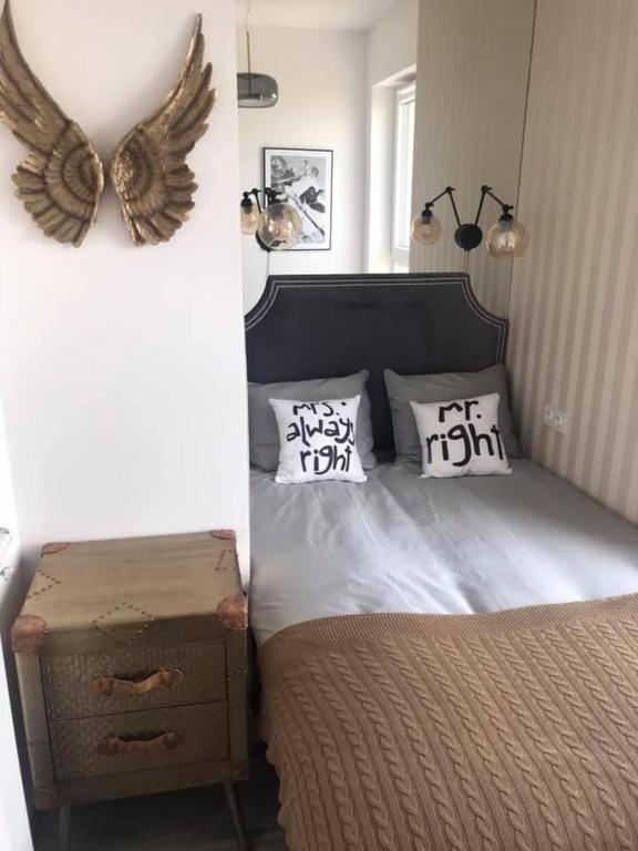 Posteľ alebo postele v izbe v ubytovaní Luxury Wola Apartament
