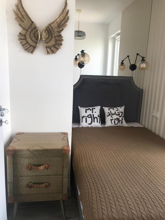 Posteľ alebo postele v izbe v ubytovaní Luxury Wola Apartament