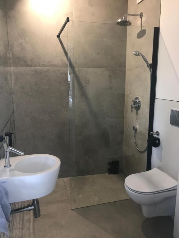 Kúpeľňa v ubytovaní Luxury Wola Apartament