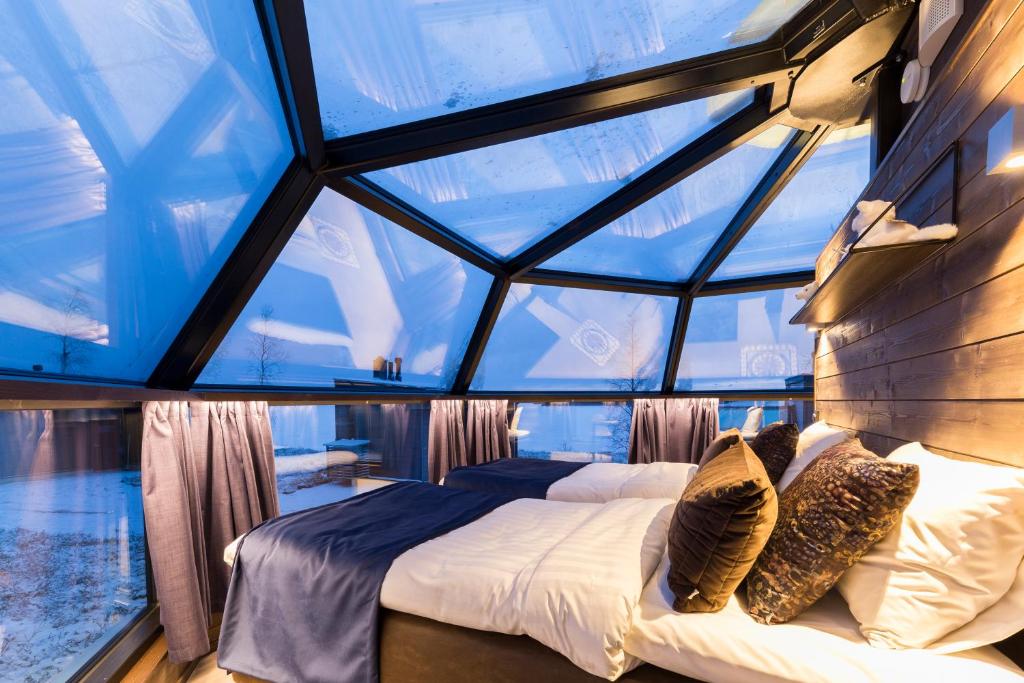 Voodi või voodid majutusasutuse Ranua Resort Arctic Igloos toas