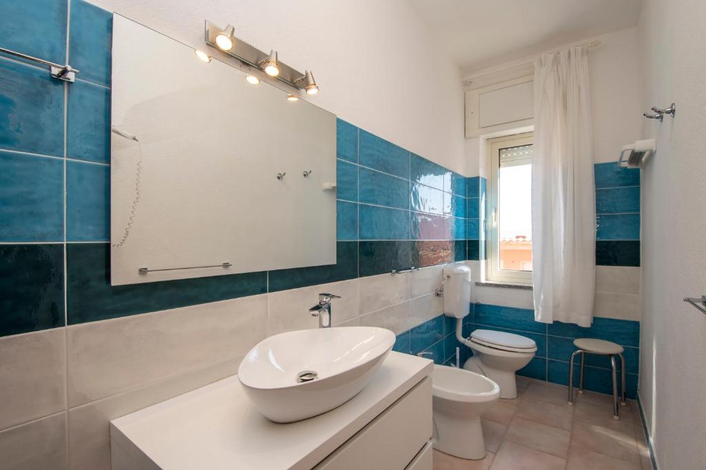 Koupelna v ubytování A.I.R. Hotel Gabbiano