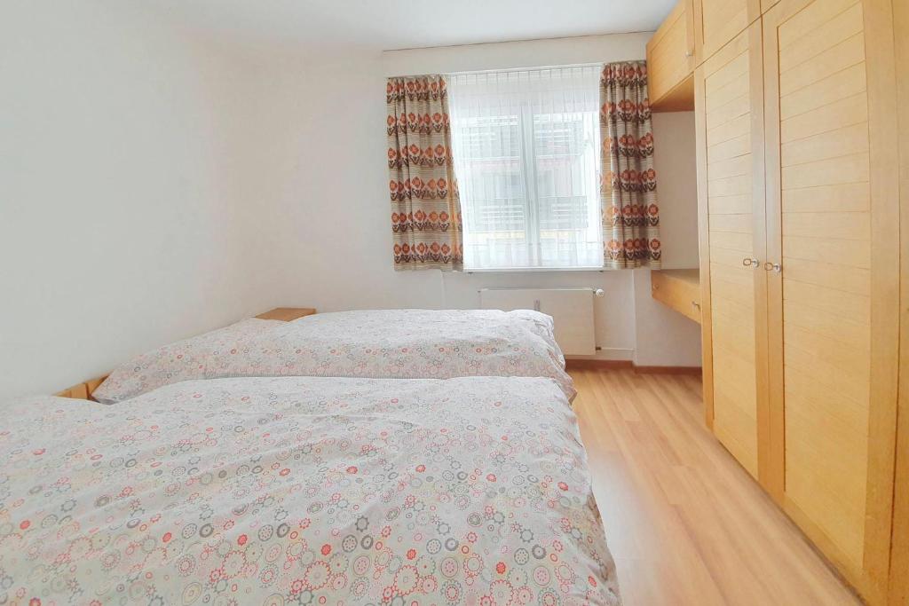 Postel nebo postele na pokoji v ubytování Serviced Apartments Wallis