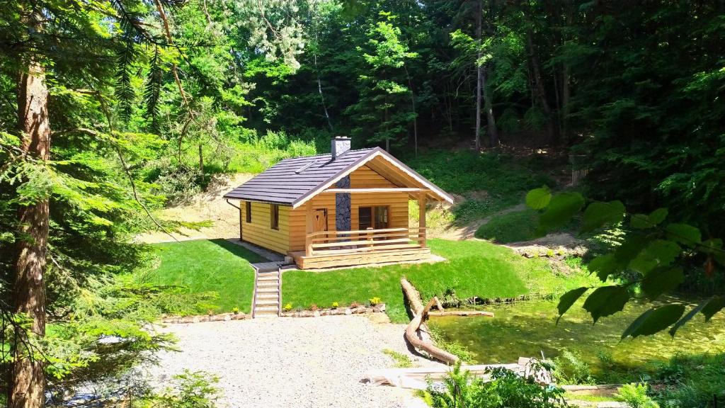 Vonkajšia záhrada v ubytovaní Bieszczady Domek Nad Stawem
