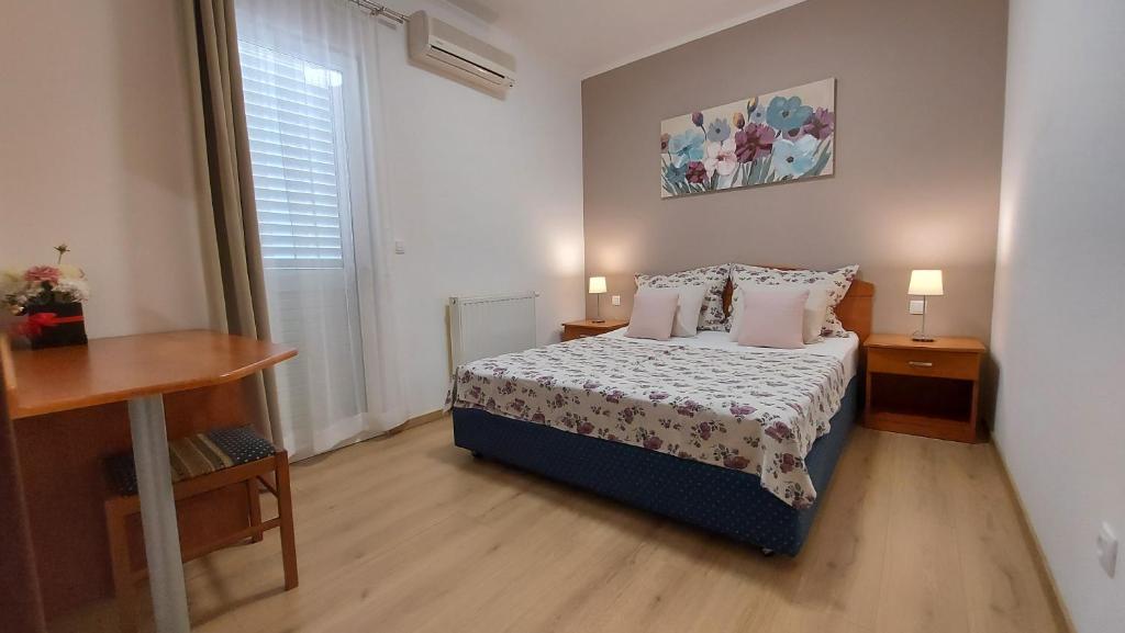 Postel nebo postele na pokoji v ubytování Villa Rossa