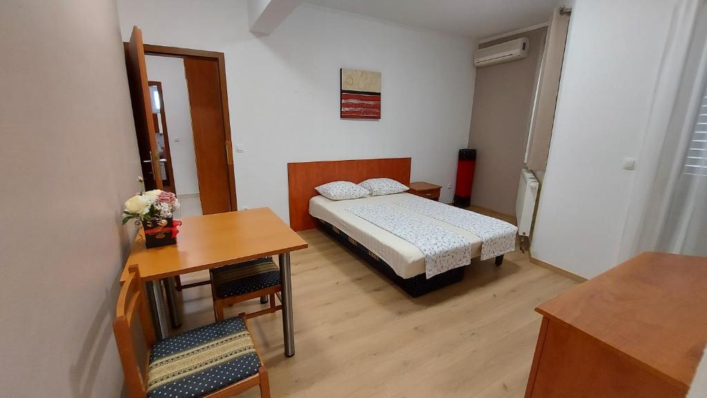 Postel nebo postele na pokoji v ubytování Villa Rossa