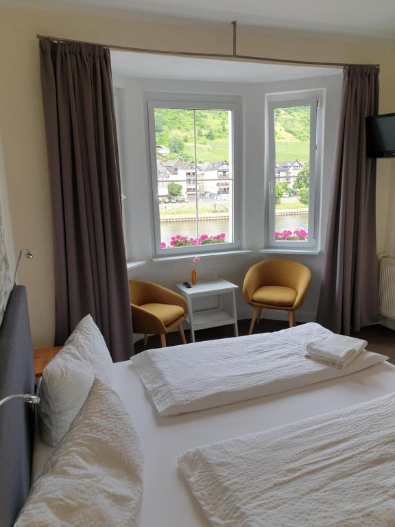 Postel nebo postele na pokoji v ubytování Haus Burgfrieden Cochem