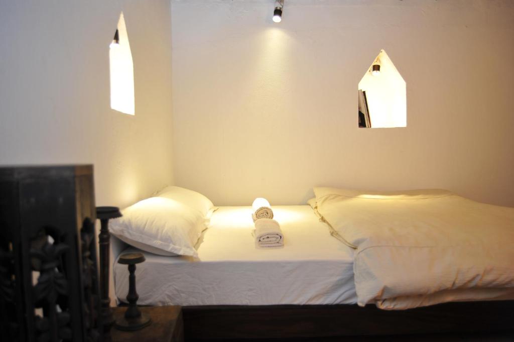 Postel nebo postele na pokoji v ubytování Peacock Guest House