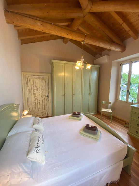 Postel nebo postele na pokoji v ubytování Piccola Meraviglia Sul Garda