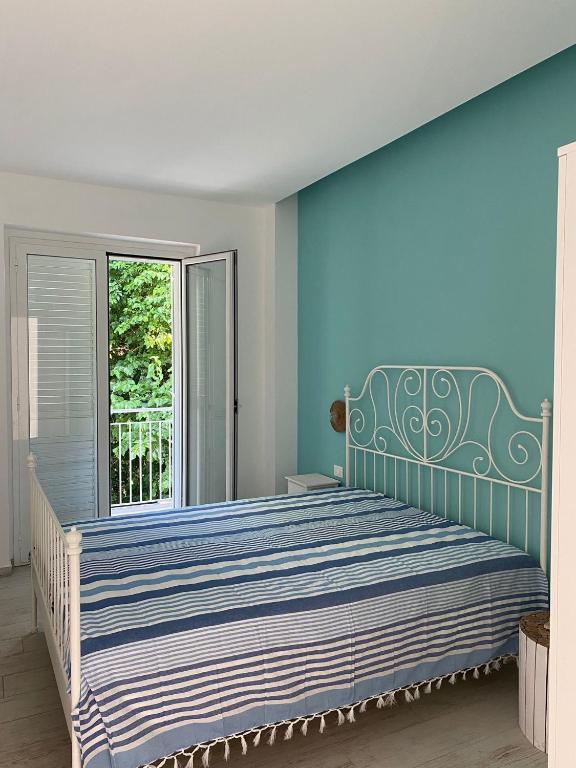 A bed or beds in a room at Artaleammare