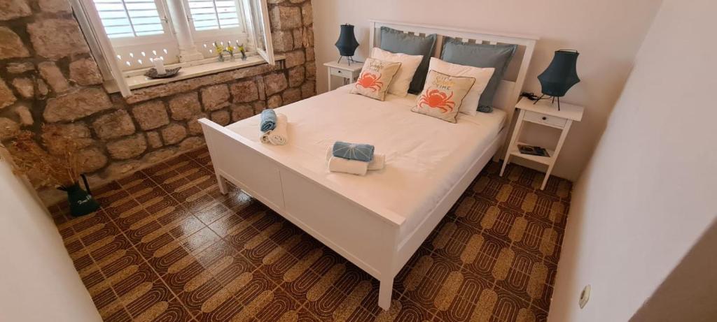 Posteľ alebo postele v izbe v ubytovaní Beach front AmF Holiday Home