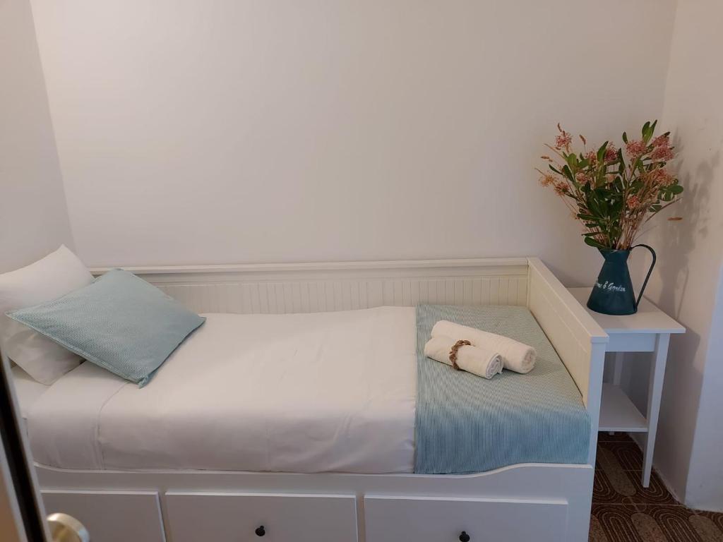Posteľ alebo postele v izbe v ubytovaní Beach front AmF Holiday Home