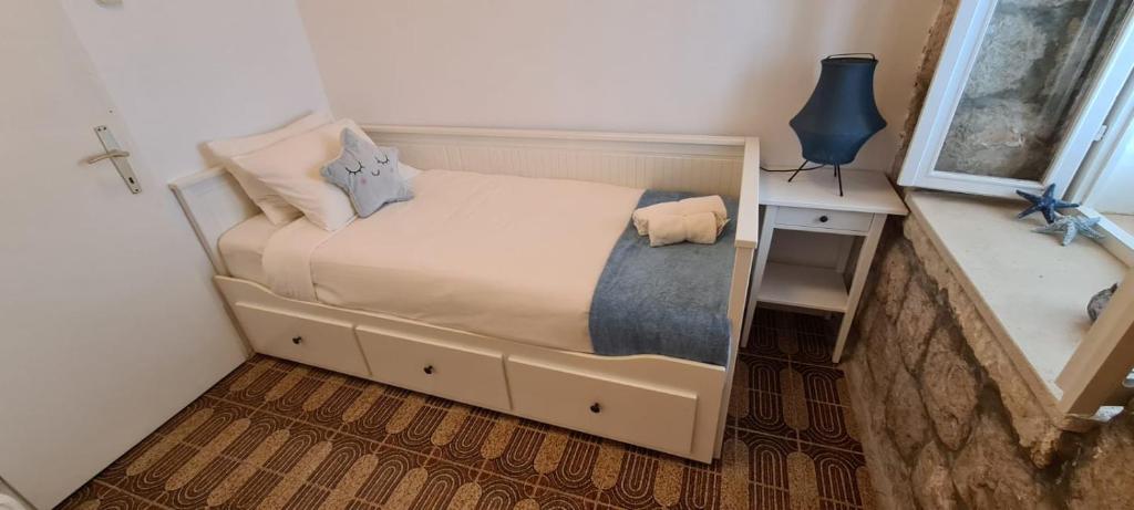 Posteľ alebo postele v izbe v ubytovaní Beach front AmF Holiday Home