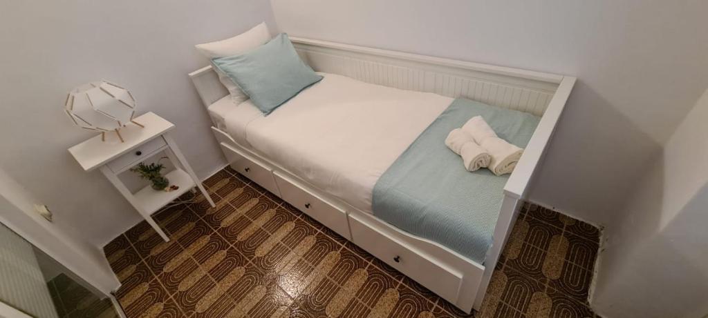 Posteľ alebo postele v izbe v ubytovaní Beach front AmF Holiday Home