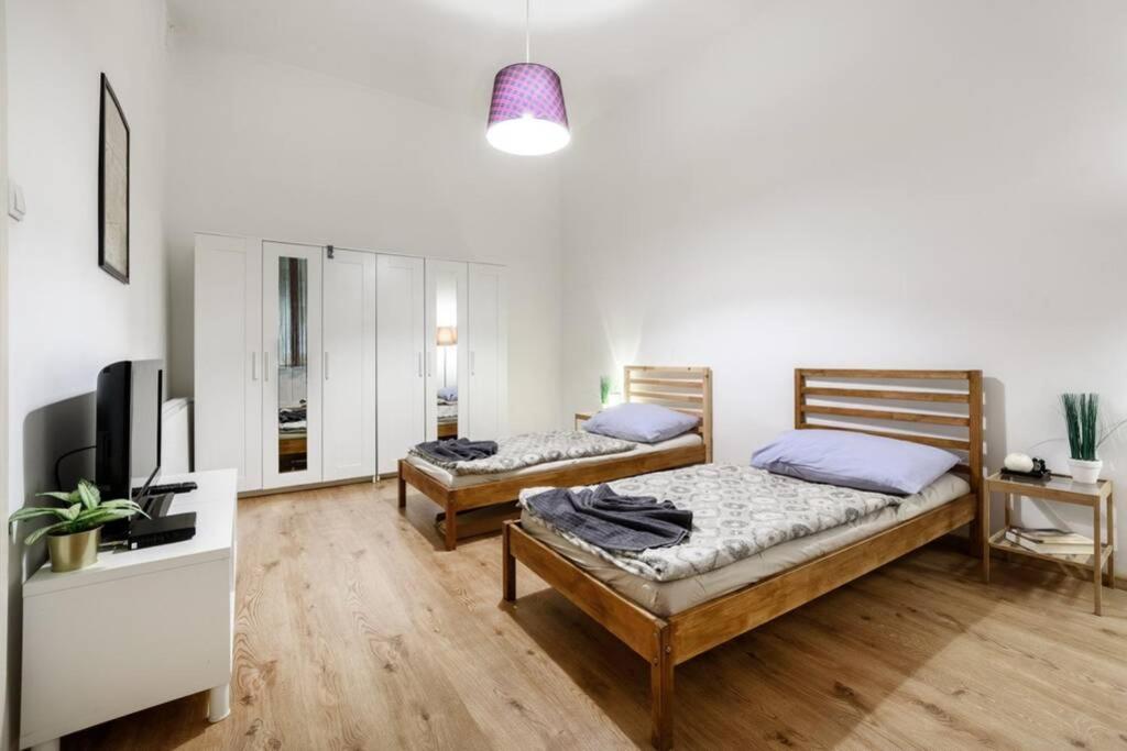 Posteľ alebo postele v izbe v ubytovaní Miracle Home - City Center