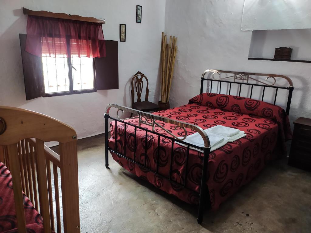 Postel nebo postele na pokoji v ubytování Alojamiento Rural Mendoza