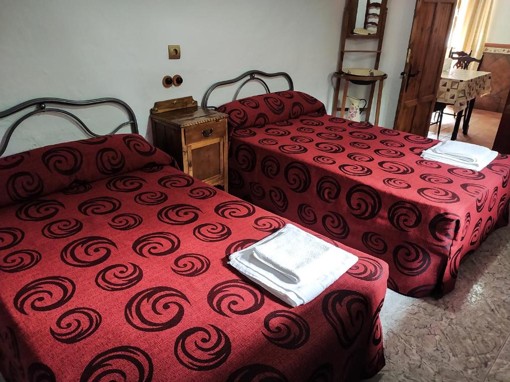 Postel nebo postele na pokoji v ubytování Alojamiento Rural Mendoza