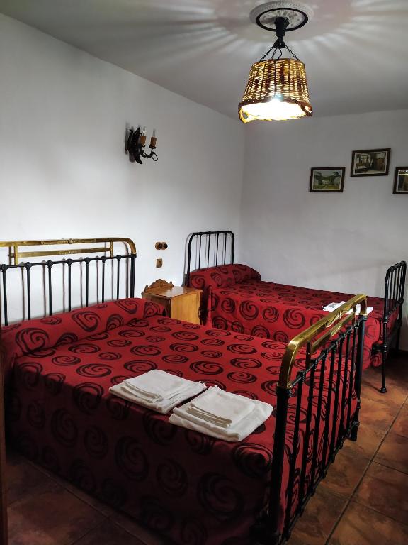 Postel nebo postele na pokoji v ubytování Alojamiento Rural Mendoza
