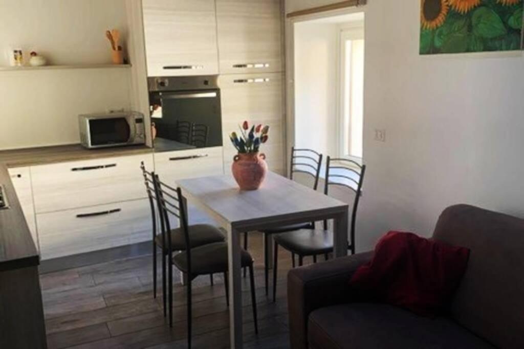 Kuchyň nebo kuchyňský kout v ubytování Casetta al Portico, relax e tranquillità
