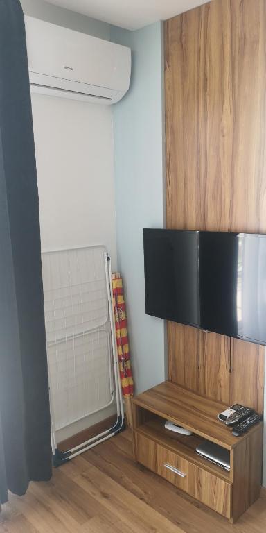 TV a/nebo společenská místnost v ubytování Marina Plaza Apartamenty