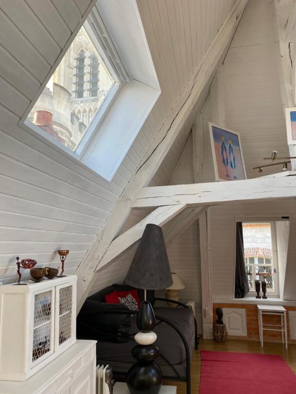 TV a/nebo společenská místnost v ubytování Loft de Lancelot City Center