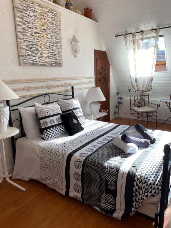 Postel nebo postele na pokoji v ubytování Loft de Lancelot City Center