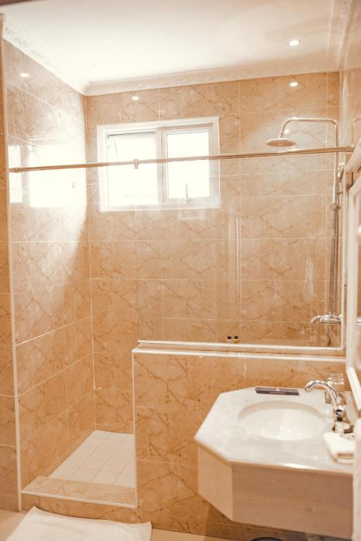 Koupelna v ubytování Cap Kivu Hôtel