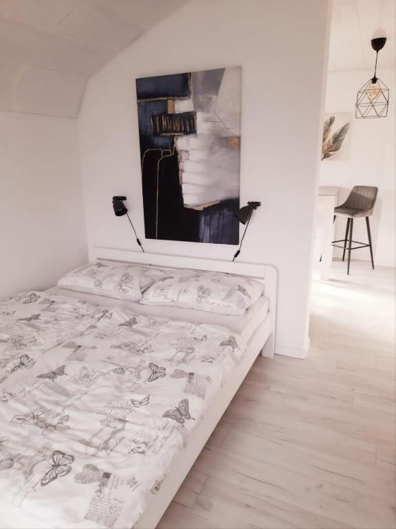 Cama ou camas em um quarto em Guest House Tena