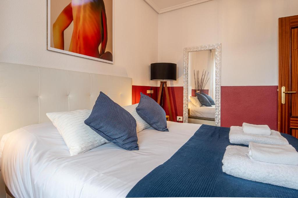 Posteľ alebo postele v izbe v ubytovaní Palermo Beach by Beauty Rentals