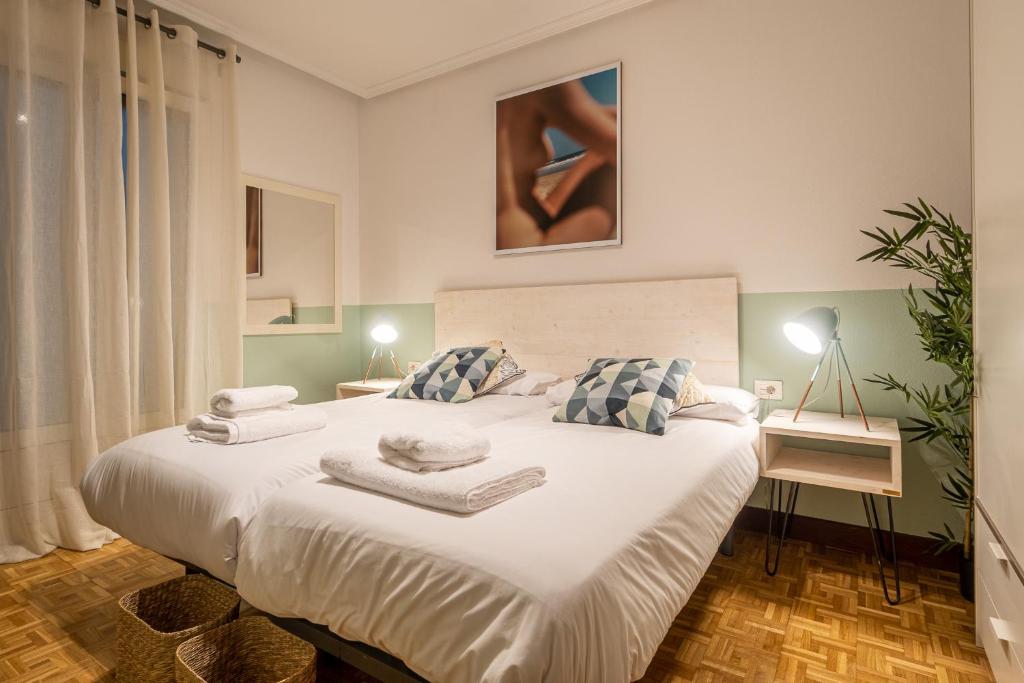 Posteľ alebo postele v izbe v ubytovaní Palermo Beach by Beauty Rentals