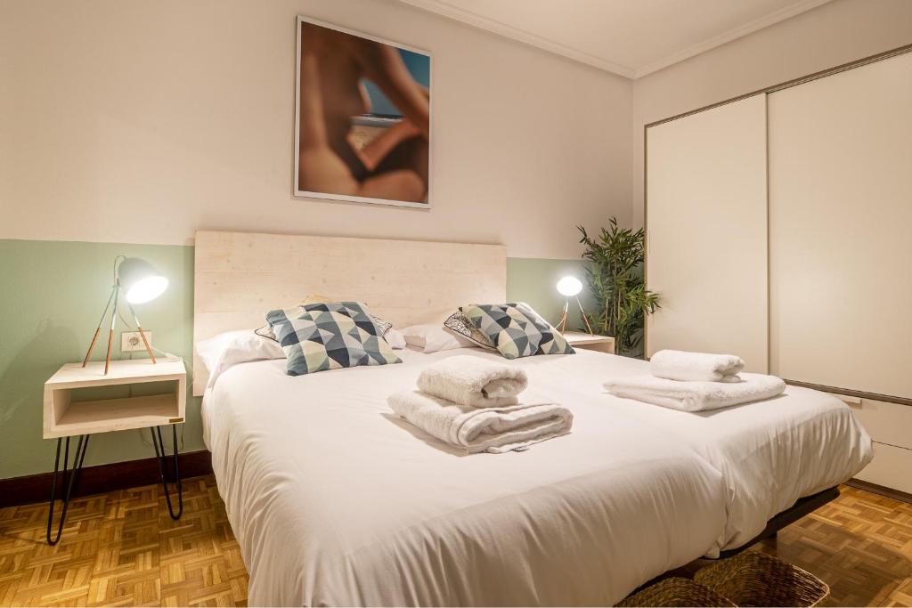 Posteľ alebo postele v izbe v ubytovaní Palermo Beach by Beauty Rentals
