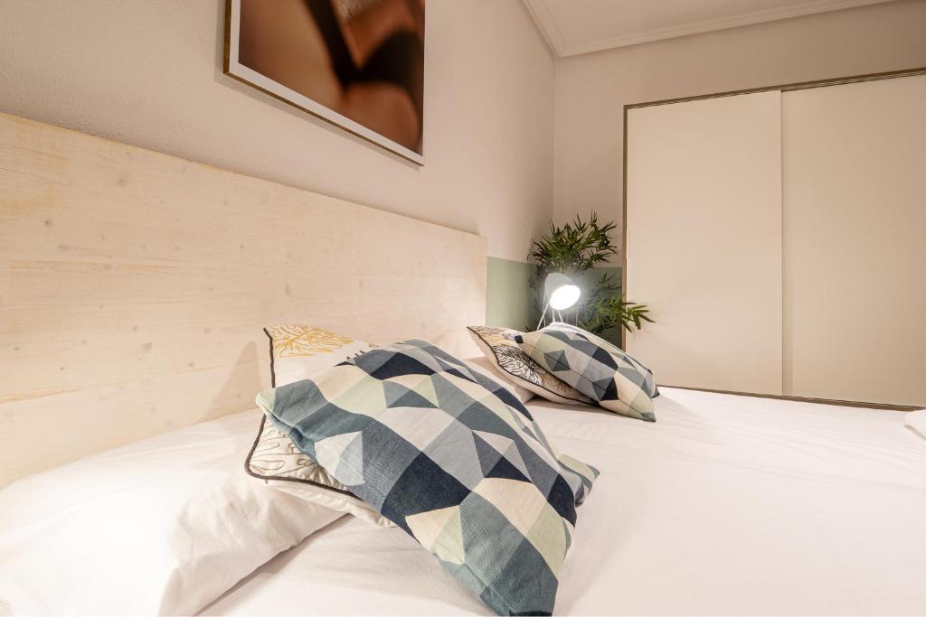 Posteľ alebo postele v izbe v ubytovaní Palermo Beach by Beauty Rentals