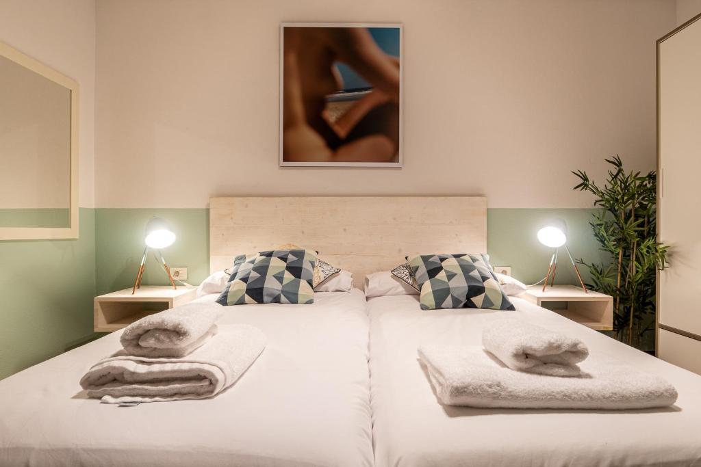 Posteľ alebo postele v izbe v ubytovaní Palermo Beach by Beauty Rentals