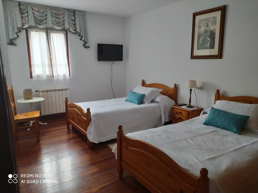 Postel nebo postele na pokoji v ubytování Astei Nekazalturismoa