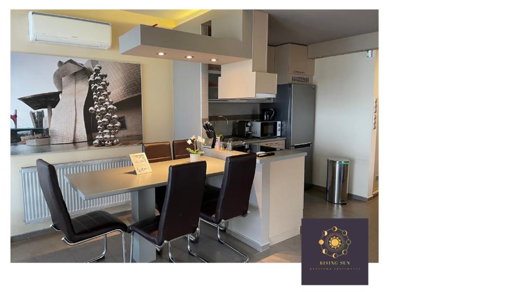 Kuchyňa alebo kuchynka v ubytovaní Rising Sun Panorama Apartman I