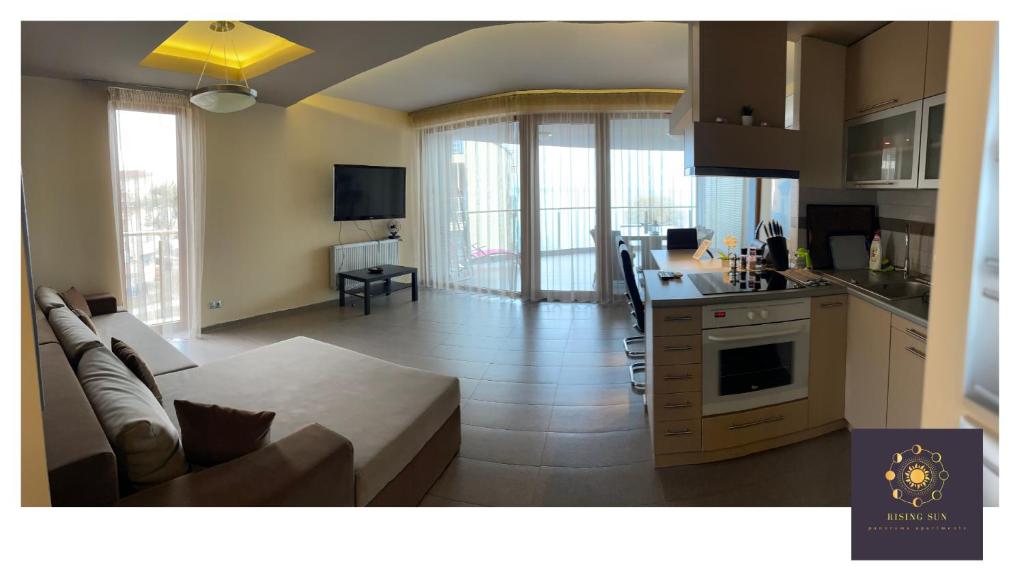 Kuchyňa alebo kuchynka v ubytovaní Rising Sun Panorama Apartman I