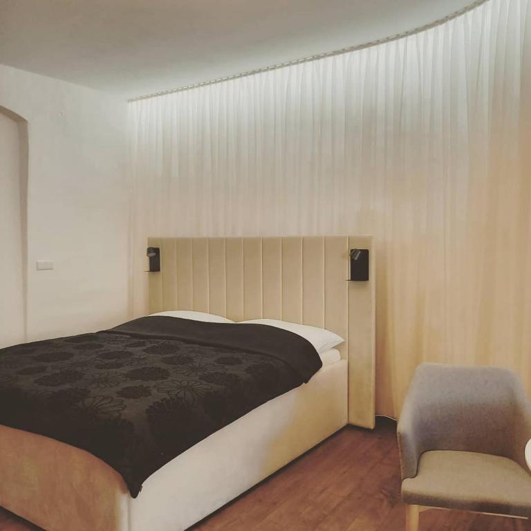Letto o letti in una camera di Hotel Svambersky dum