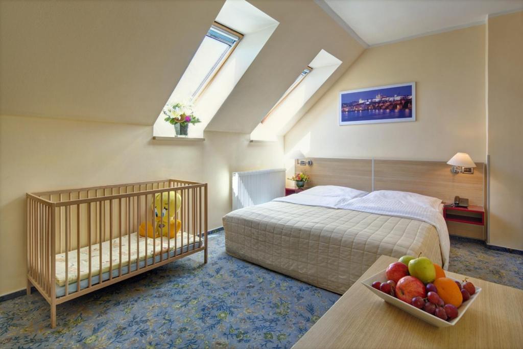 Postel nebo postele na pokoji v ubytování Hotel Michael
