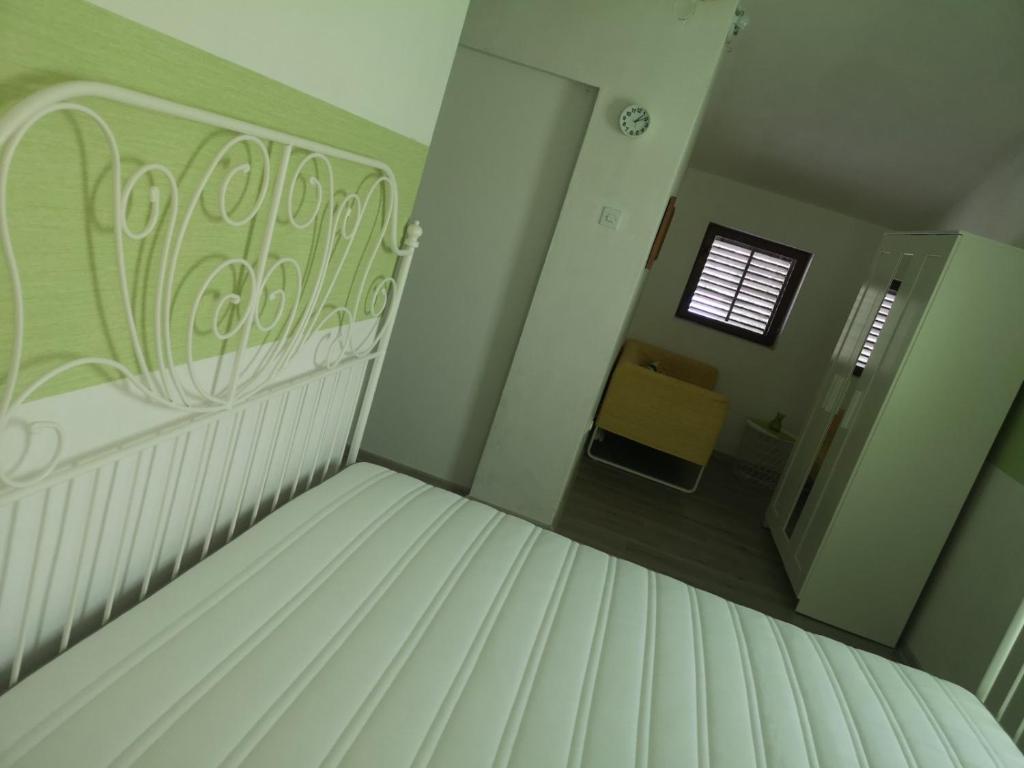Posteľ alebo postele v izbe v ubytovaní Villa Rose Ann