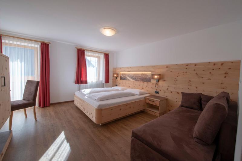Postel nebo postele na pokoji v ubytování Appartment Kirch Neuhaus